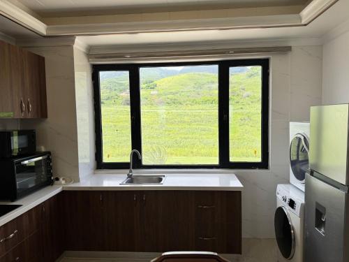 Dapur atau dapur kecil di Seaview Garden