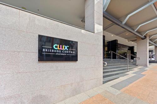 a sign on the side of a building at CLLIX Brisbane Central Apartments in Brisbane