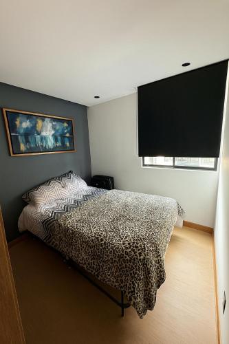 Ένα ή περισσότερα κρεβάτια σε δωμάτιο στο Apartamento de Lujo frente al CC Viva