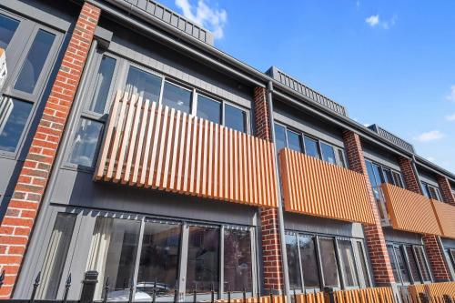 an exterior view of a building with windows at George Hotel Launceston, an Ascend Collection Hotel in Launceston