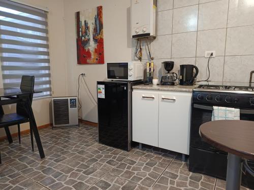 Kuchyň nebo kuchyňský kout v ubytování Departamento full equipado en Coyhaique