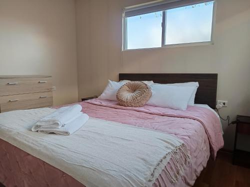 Postel nebo postele na pokoji v ubytování Departamento full equipado en Coyhaique