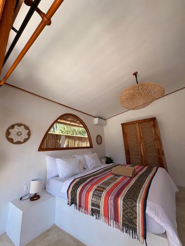 Ένα ή περισσότερα κρεβάτια σε δωμάτιο στο You & Me Private Villa