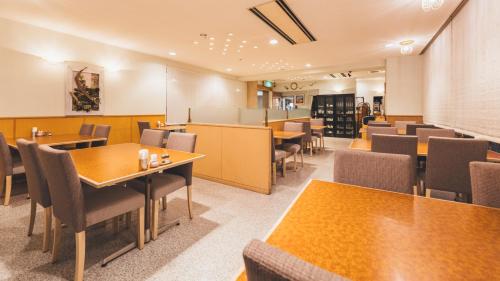 Restoran atau tempat lain untuk makan di アーバンホテル二本松