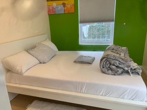 Ένα ή περισσότερα κρεβάτια σε δωμάτιο στο The Green Place of Newark