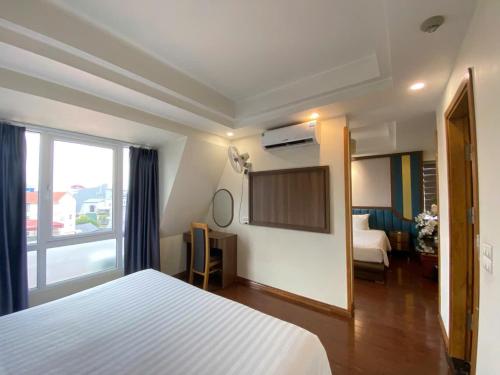 Cama o camas de una habitación en Sky Charm Hanoi Hotel and Spa
