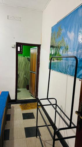 a room with a bed and a view of the ocean at Beni Beach Resort Batticaloa, Sri Lanka in Kallady