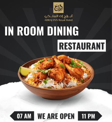 a poster for a restaurant with a bowl of food at Abraj INN Royal Hotel فندق أبراج إن الملكي in Doha