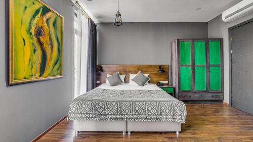 Postel nebo postele na pokoji v ubytování Hotel Gino Wellness Mtskheta