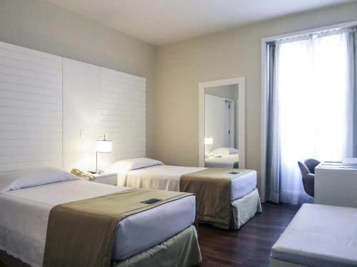 Katil atau katil-katil dalam bilik di Mercure Rio Boutique Hotel Copacabana