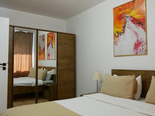 Postel nebo postele na pokoji v ubytování Primera Apartments