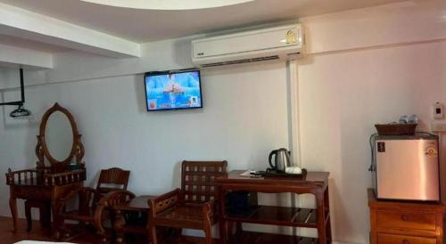TV o dispositivi per l'intrattenimento presso Jirawan Hotel