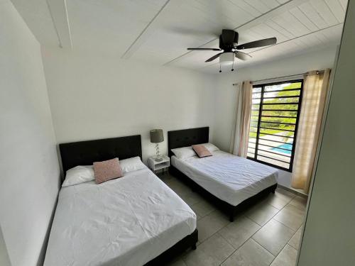 Postel nebo postele na pokoji v ubytování Casa Finca en La Unión Valle con piscina - Pompano