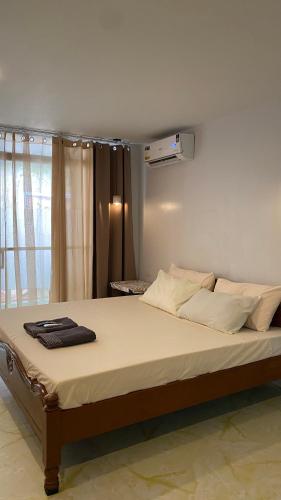 Cama o camas de una habitación en Isla Haus Boracay