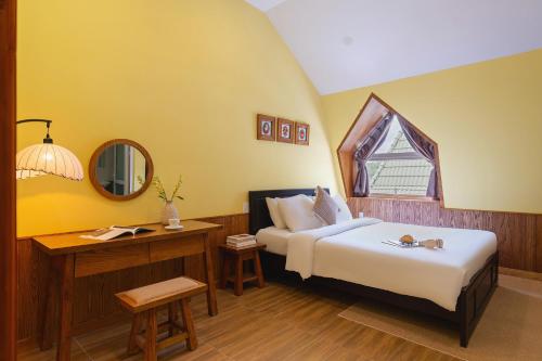 Postel nebo postele na pokoji v ubytování Moon Garden Hotel