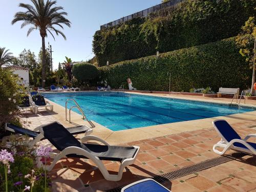 The swimming pool at or near Luxe Villa Puerto Banus