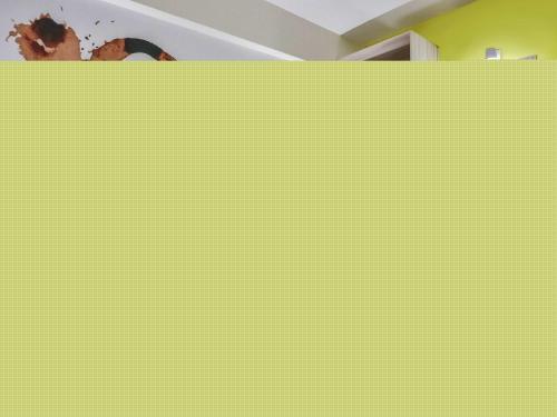 a yellow wall with a painting on it at ibis Styles Vitoria da Conquista in Vitória da Conquista