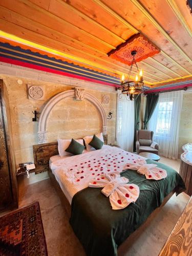 Postel nebo postele na pokoji v ubytování Elite Rose Cappadocia