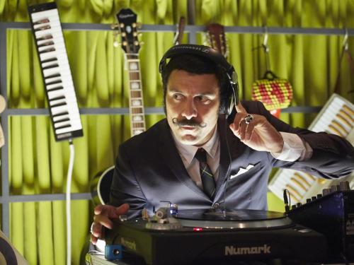 a man in a suit with headphones and a keyboard at Mama Shelter Marseille in Marseille