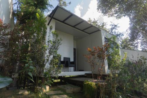 a modern house with a glass roof at 方圓行止 Funyuan Village in Puli