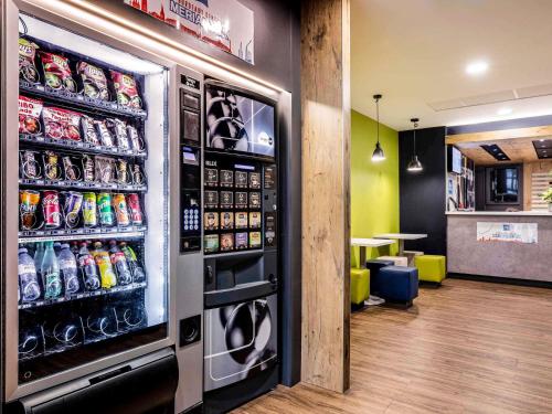 a large refrigerator filled with lots of drinks at ibis budget Bordeaux Centre Mériadeck in Bordeaux