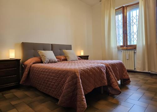 Ένα ή περισσότερα κρεβάτια σε δωμάτιο στο Easy Firenze - 10min from Airport