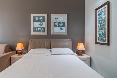 Ένα ή περισσότερα κρεβάτια σε δωμάτιο στο Villa Floyd Charming Rooms
