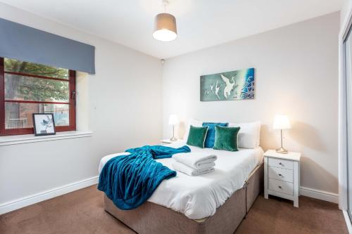 En eller flere senge i et værelse på Elliot Suite No2 - Donnini Apartments