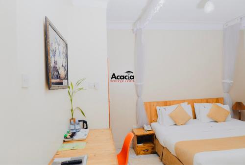 Katil atau katil-katil dalam bilik di Acacia Hotel Mbarara