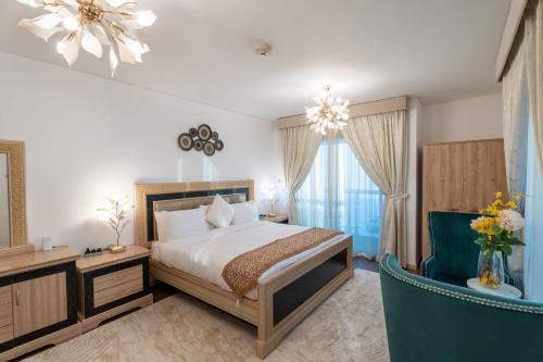 a bedroom with a bed and a large window at Veer Apartments - 87th Floor Penthouse Full Sea View 5 BHK in Dubai