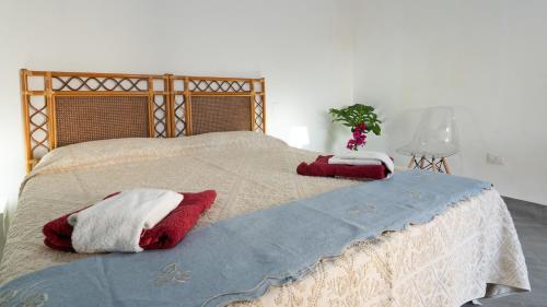Katil atau katil-katil dalam bilik di Agro Antico B&b