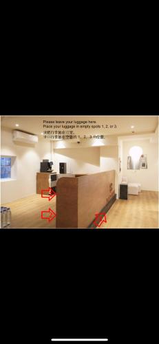 a living room with a desk and a room with a unintention at Trip made in Busan
