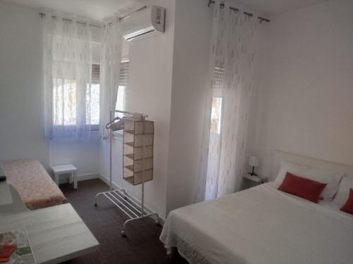 Postel nebo postele na pokoji v ubytování MLH Matera