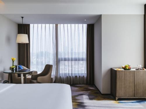 Pullman Fuzhou Tahoeにあるベッド