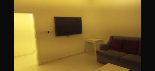 Μια τηλεόραση ή/και κέντρο ψυχαγωγίας στο MED Suites and Appartments