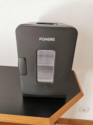 a toaster sitting on top of a table at Tidale Host house B&B in Alghero
