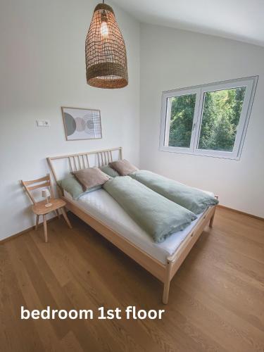 Postel nebo postele na pokoji v ubytování Refugium im Wald