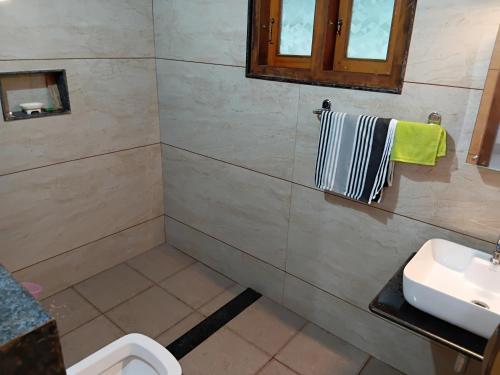 Un baño de Thondalli Villa