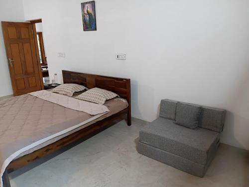 Cama o camas de una habitación en Thondalli Villa