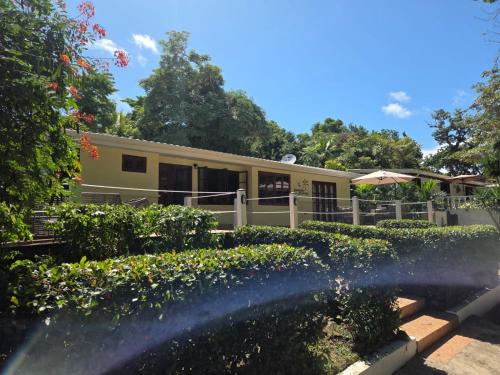 a water fountain in front of a building at Contadora Island Inn in Contadora