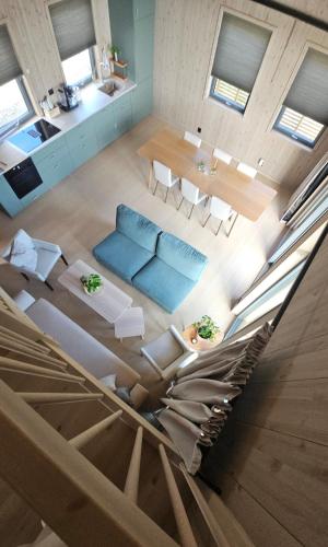 an aerial view of a living room and dining room at Sjåen på Balsnes Gård in Hitra