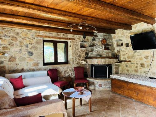 Μια τηλεόραση ή/και κέντρο ψυχαγωγίας στο Fos Guesthouse