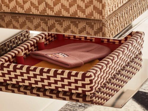 a brown wicker basket with a towel in it at Mama Shelter Toulouse in Toulouse