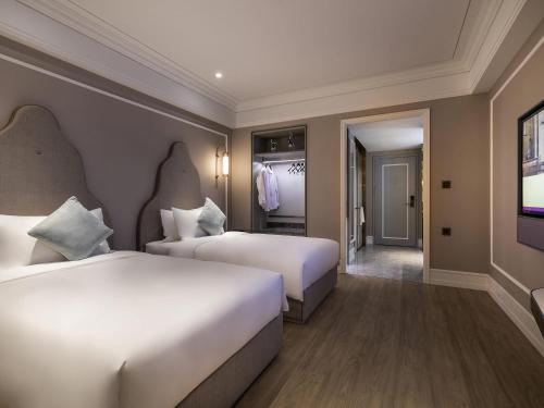 Mercure Shanghai Global Harbourにあるベッド