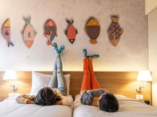 Postel nebo postele na pokoji v ubytování ibis Kolkata Rajarhat - An Accor Brand