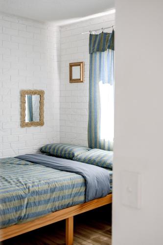 Cama o camas de una habitación en Coastal Hideaway in Coolum Beach