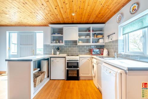 Η κουζίνα ή μικρή κουζίνα στο 2 Bed in Wellington Bridge oc-i392