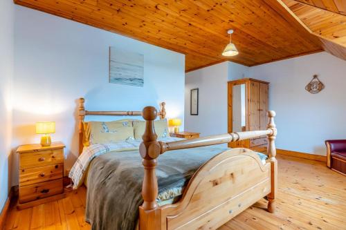 a bedroom with a bed and a wooden ceiling at 2 Bed in Wellington Bridge oc-i392 in Nelson Bridge