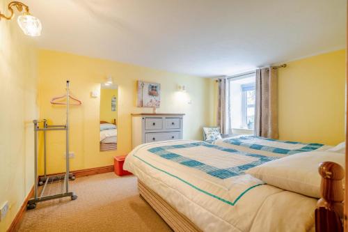 a bedroom with a bed and a window at 2 Bed in Wellingtonbridge oc-ii03414 in Nelson Bridge