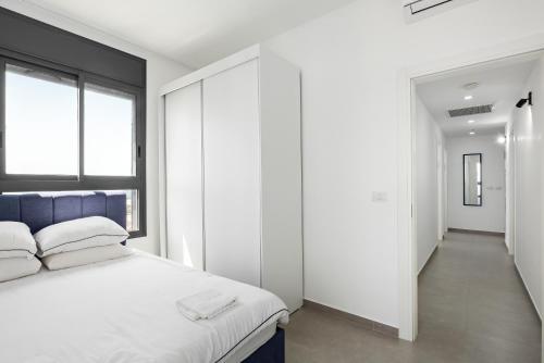 The Beach Tower Residenceにあるベッド